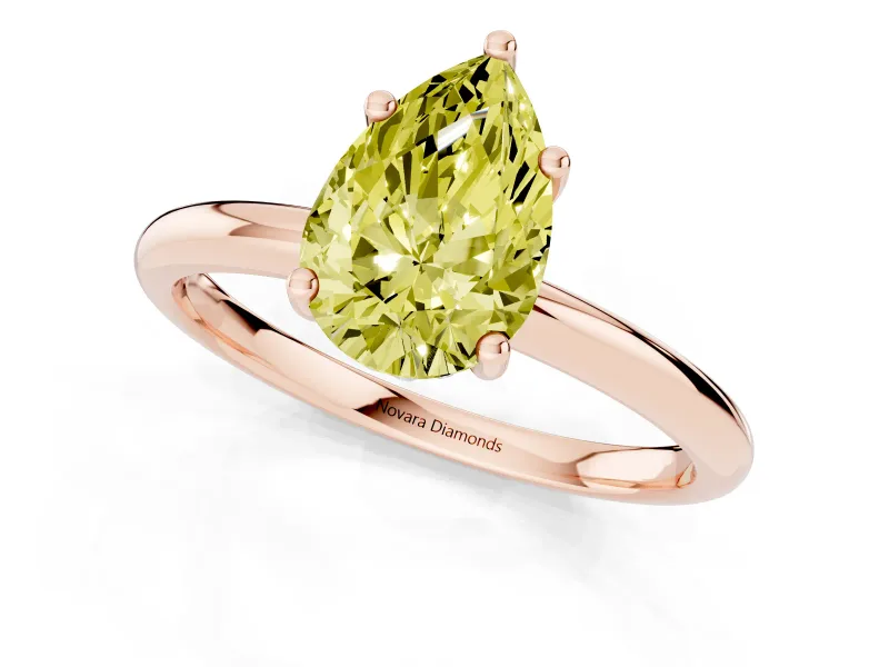 Fancy Yellow Pear Cut Diamond Solitaire Engagement Ring Set in Rose gold with Prong Setting and Polished Band