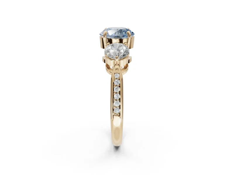 Round Three Stone Engagement Ring Setting for a Fancy Blue Lab-Grown Diamond | Tapered Pave Band | Yellow Gold