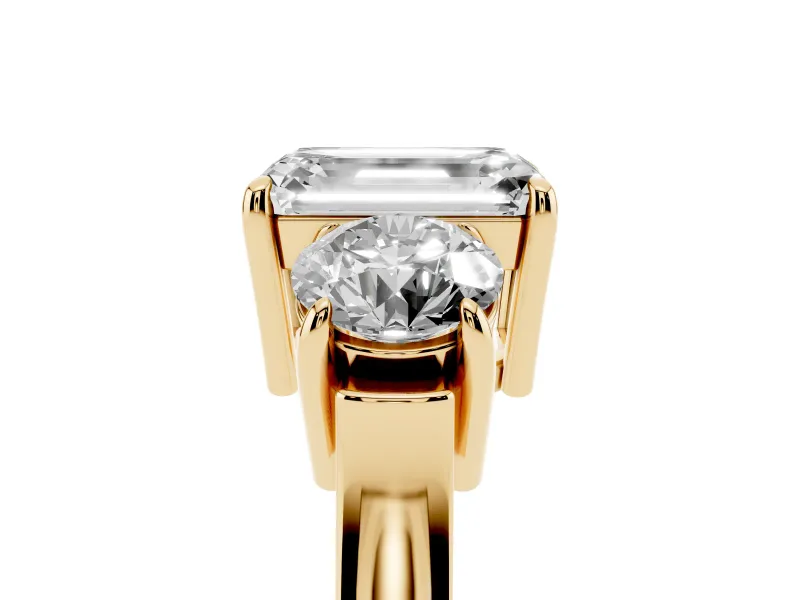 Emerald Cut Three Stone Engagement Ring Setting | Round Side Stones and Open Baskets | Yellow Gold