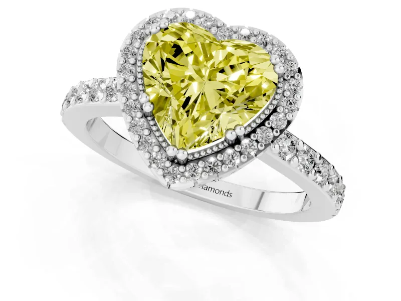 Fancy Yellow Heart Cut Diamond Halo Engagement Ring Set in White gold with Milgrain Detail and Pavé Band