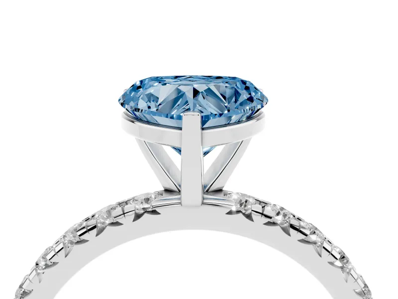Fancy Blue Heart Cut Diamond Pavé Solitaire Ring Set in Silver with Round Band and Prong Setting