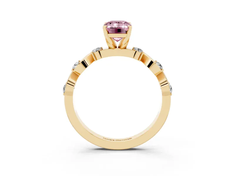 Fancy Pink Emerald Cut Diamond Solitaire Ring Set in Yellow gold with Ribbon Twist Band, Round Accents and Prong Setting