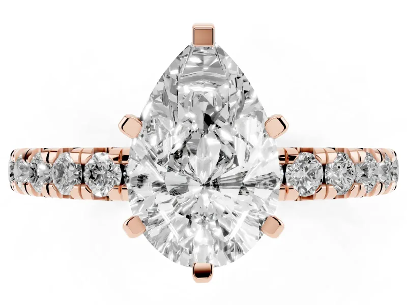 Pear Cut Diamond Pavé Solitaire Ring Set in Rose gold with Round Band and Prong Setting