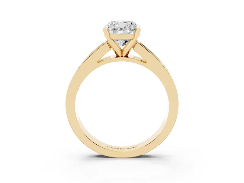 Cushion Cut Diamond Solitaire Ring Set in Yellow gold with Channel-Set Band and Prong Setting