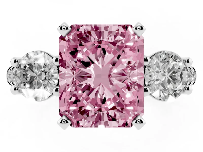 Fancy Pink Three-Stone Radiant Cut Diamond Pavé Band Ring Set in White gold with Prong-Set Trio
