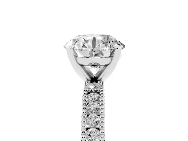 Round Cut Diamond Solitaire Ring Set in Platinum with Slim Pavé Band and Prong Setting