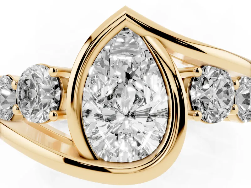 Pear-Shaped Bezel Bypass Engagement Ring Setting | Round Side Stones | Yellow Gold