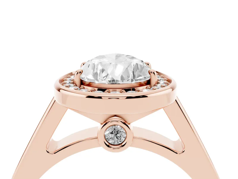 Pear Cut Diamond Halo Solitaire Ring Set in Rose gold with Pavé Band and Bezel Setting