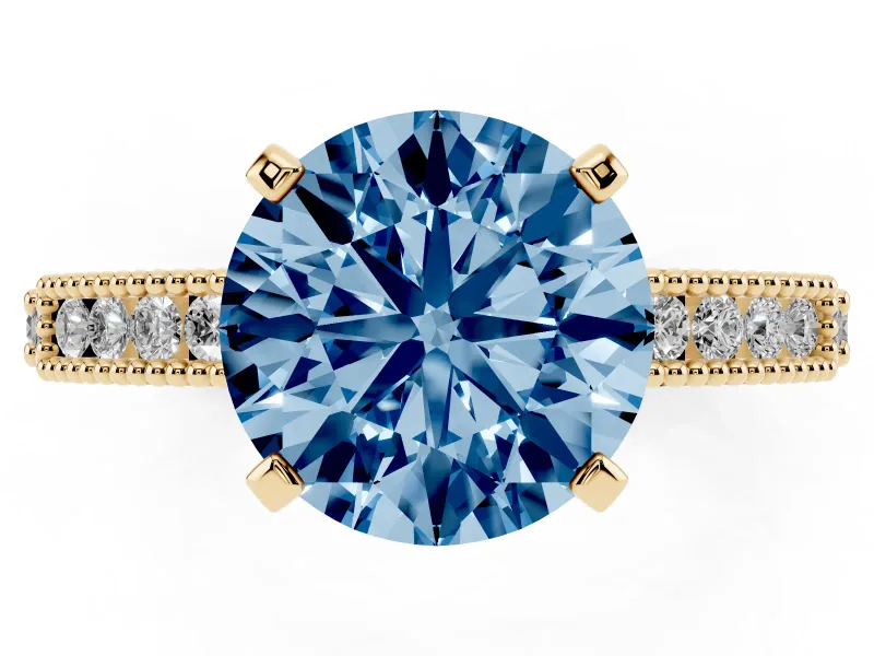Fancy Blue Round Cut Diamond Solitaire Ring Set in Yellow gold with Slim Pavé Band and Prong Setting
