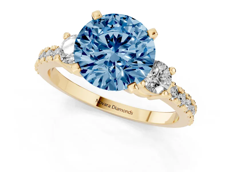 Fancy Blue Three-Stone Round Cut Diamond Pavé Band Ring Set in Yellow gold with Prong Setting
