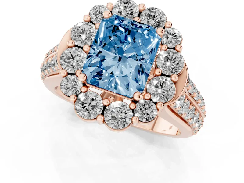 Fancy Blue Radiant Cut Diamond Halo Engagement Ring Set in Rose gold with Split Shank and Prong Setting