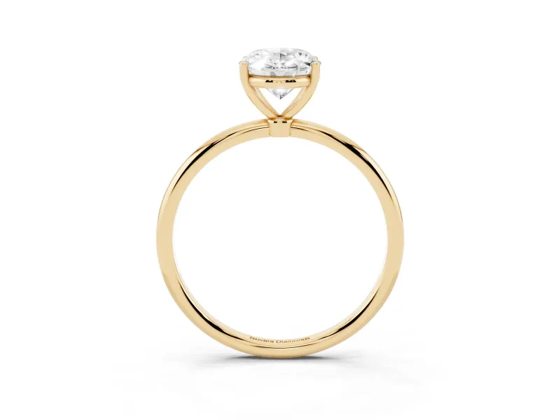 Oval Cut Diamond Solitaire Engagement Ring Set in Yellow gold with Thin Band and Prong Setting