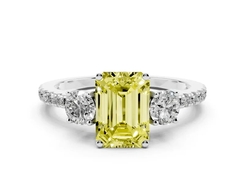 Fancy Yellow Emerald Cut Diamond Three-Stone Ring Set in Platinum with Pavé Band and Graduated Sides