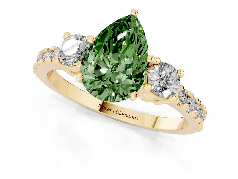 Fancy Green Three-Stone Pear Cut Diamond Pavé Band Ring Set in Yellow gold with Prong Setting