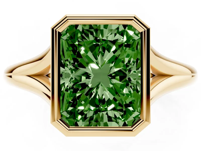 Fancy Green Bezel Set Radiant Cut Diamond Solitaire Ring Set in Yellow gold with Tapered Band
