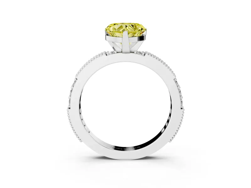 Fancy Yellow Heart Cut Diamond Solitaire Ring Set in White gold with Slim Pavé Band and Prong Setting