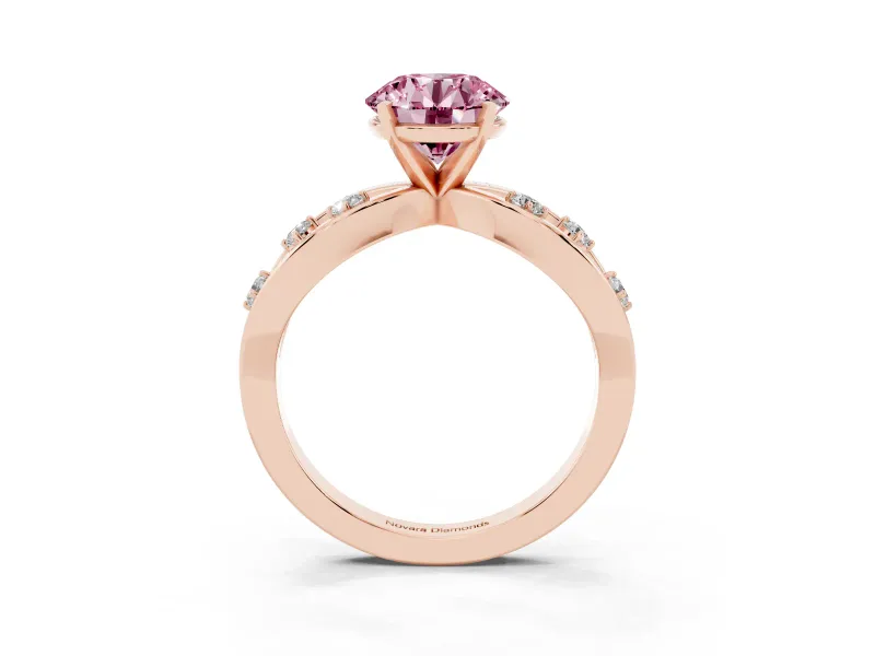Fancy Pink Round Cut Diamond Solitaire Ring Set in Rose gold with Side Stones on Criss-Cross Band and Prong Setting