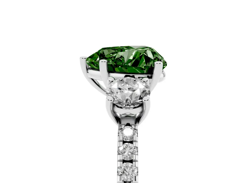 Fancy Green Heart Cut Diamond Three-Stone Ring Set in Platinum with Pavé Band and Graduated Sides