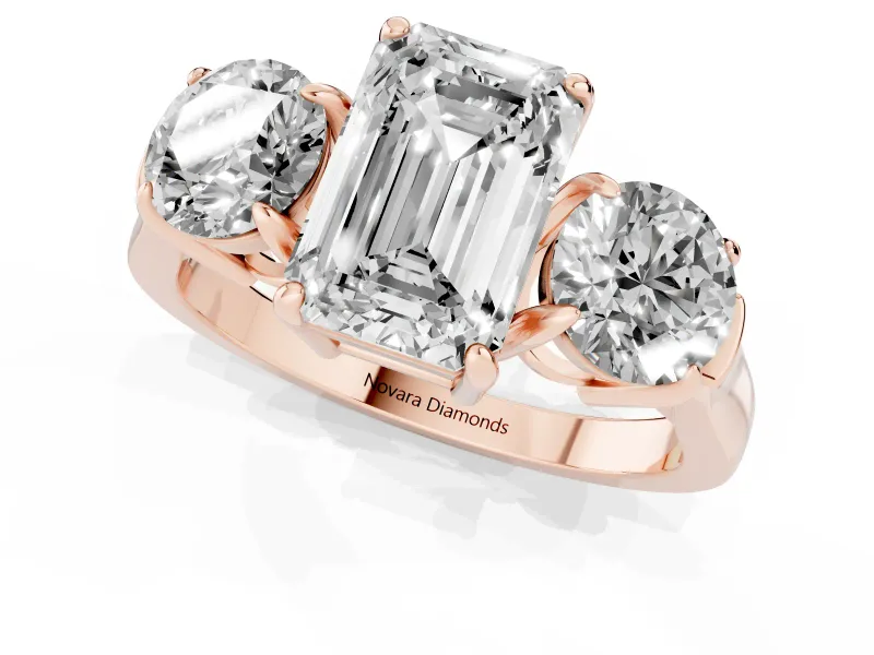 Emerald Cut Three Stone Engagement Ring Setting | Round Side Stones and Open Baskets | Rose Gold