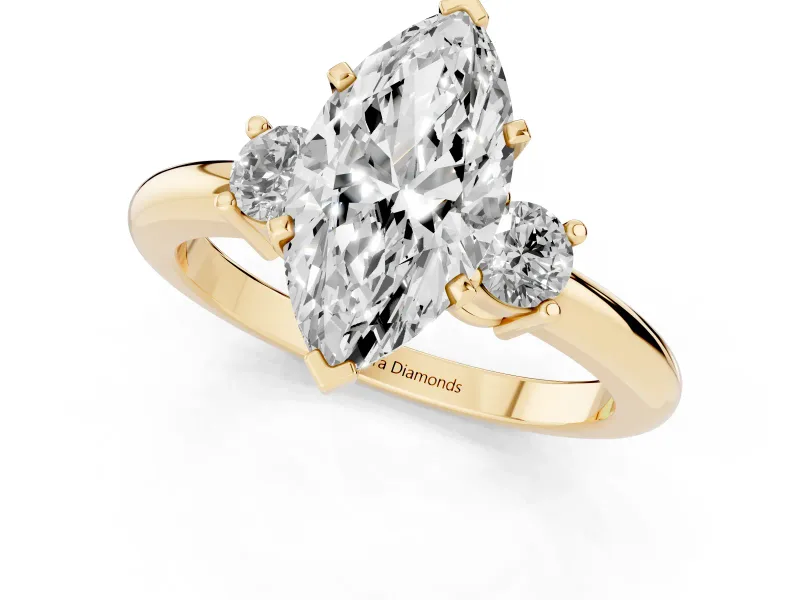 Three-Stone Marquise Cut Diamond Ring Set in Yellow gold with Prong Setting and Plain Band