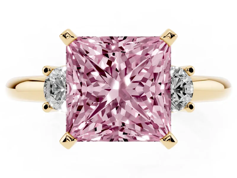 Fancy Pink Three-Stone Princess Cut Diamond Ring Set in Yellow gold with Prong Setting and Plain Band
