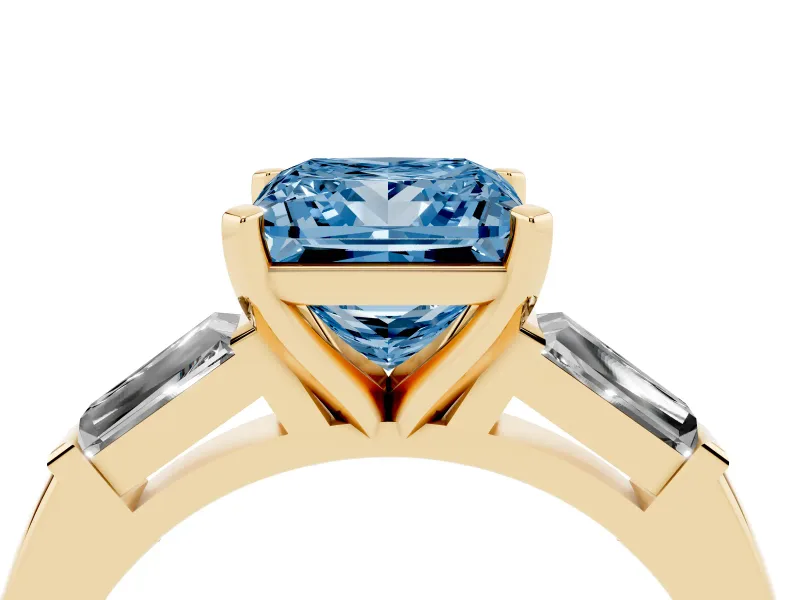 Fancy Blue Princess Cut Diamond Solitaire Ring Set in Yellow gold with Tapered Baguette Side Stones and Prong Setting