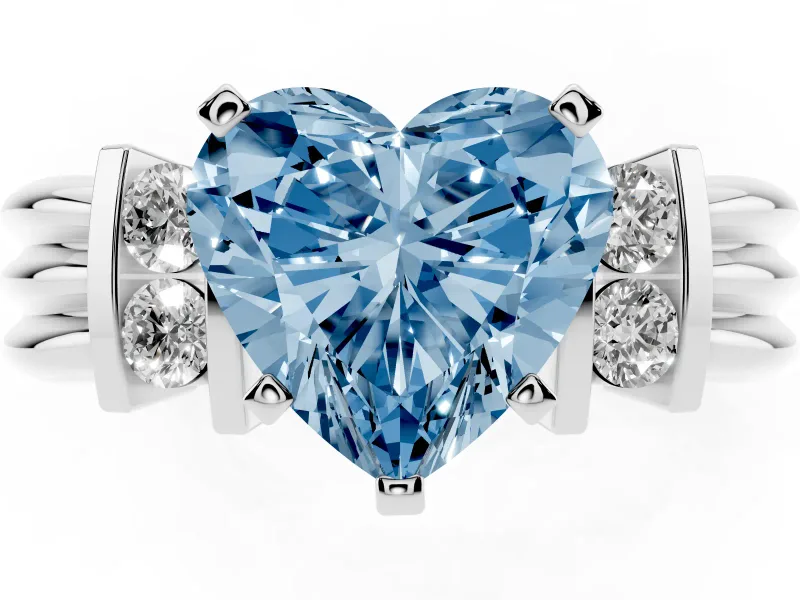 Fancy Blue Three-Stone Heart Cut Diamond Channel Set Ring Set in Platinum with Bar Prongs