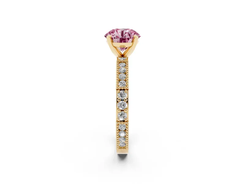 Fancy Pink Round Cut Diamond Solitaire Ring Set in Yellow gold with Slim Pavé Band and Prong Setting