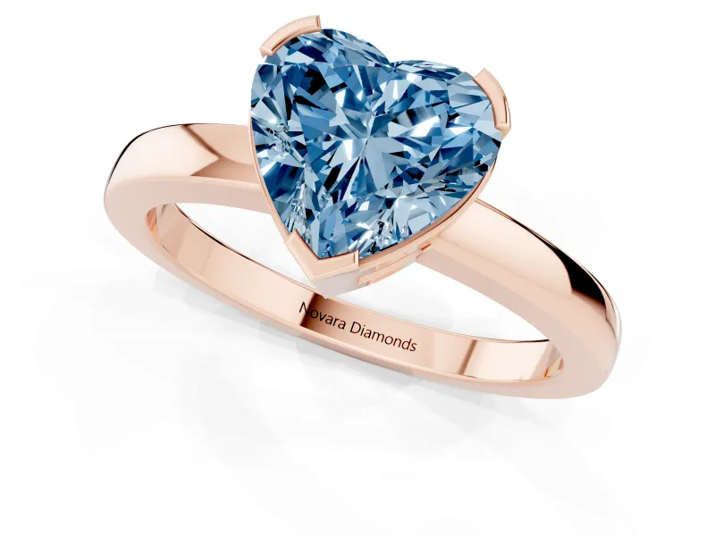 Fancy Blue Heart Cut Diamond Solitaire Ring Set in Rose gold with Prong Head and Smooth Polished Band