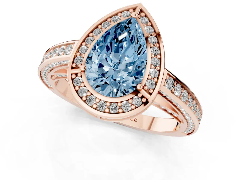 Fancy Blue Pear Cut Diamond Halo Pavé Split Shank Ring Set in Rose gold with Prong Setting