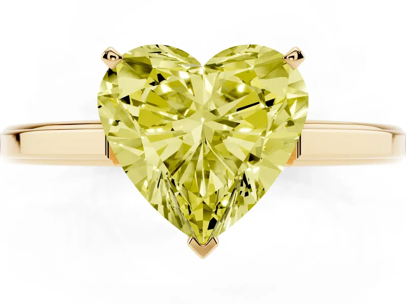 Fancy Yellow Heart Cut Diamond Solitaire Ring Set in Yellow gold with Prong Setting and Classic Band