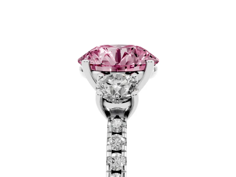 Fancy Pink Round Cut Diamond Three-Stone Ring Set in White gold with Pavé Band and Graduated Sides