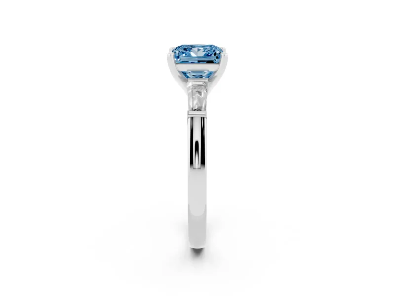 Fancy Blue Princess Cut Diamond Solitaire Ring Set in Platinum with Tapered Baguette Side Stones and Prong Setting