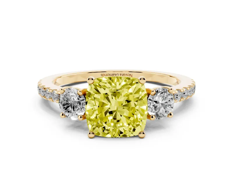 Fancy Yellow Cushion Cut Diamond Three-Stone Ring Set in Yellow gold with Pavé Band and Graduated Sides