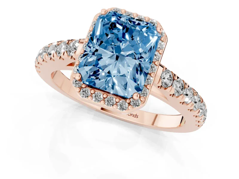 Fancy Blue Radiant Cut Diamond Halo Engagement Ring Set in Rose gold with Pavé Band and Prong Setting