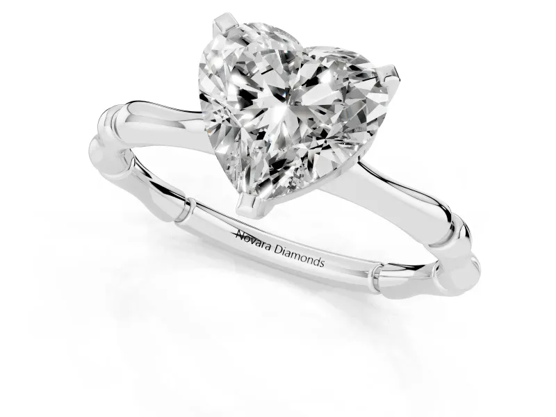 Heart Cut Diamond Solitaire Ring Set in Silver with Bamboo Band and Prong Setting