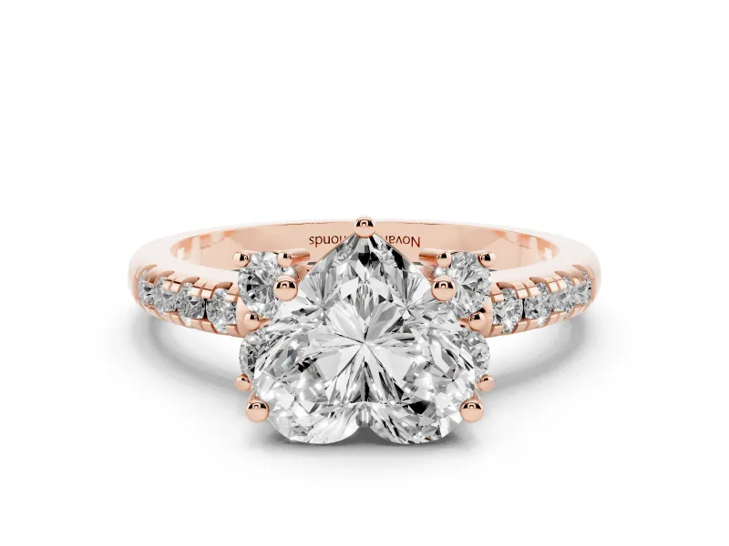 Heart Cut Diamond Three-Stone Pavé Ring Set in Rose gold with Prong Setting