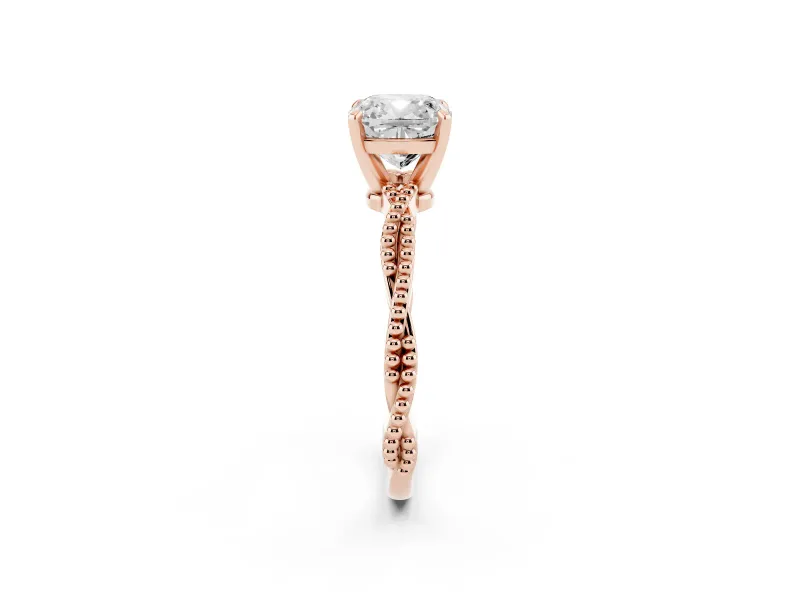 Cushion Cut Diamond Solitaire Ring Set in Rose gold with Twisted Band and Bead Prong Setting