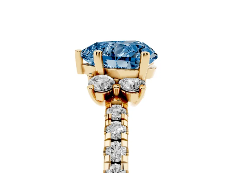 Heart-Shaped Side Stone Engagement Ring Setting for a Fancy Blue Lab-Grown Diamond | Pave Band | Yellow Gold