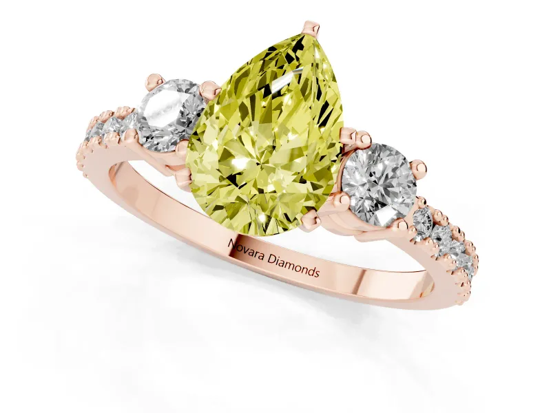Fancy Yellow Three-Stone Pear Cut Diamond Pavé Band Ring Set in Rose gold with Prong Setting