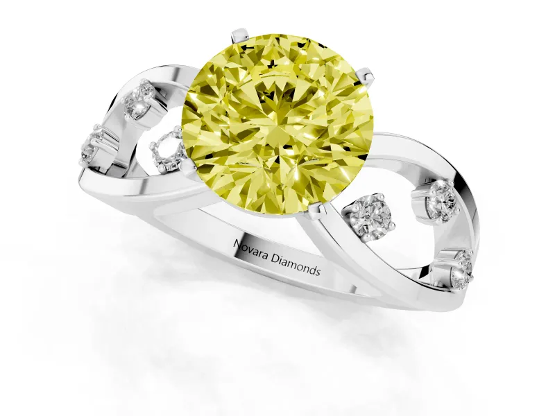 Fancy Yellow Round Cut Diamond Solitaire Ring Set in Silver with Side Stones on Criss-Cross Band and Prong Setting
