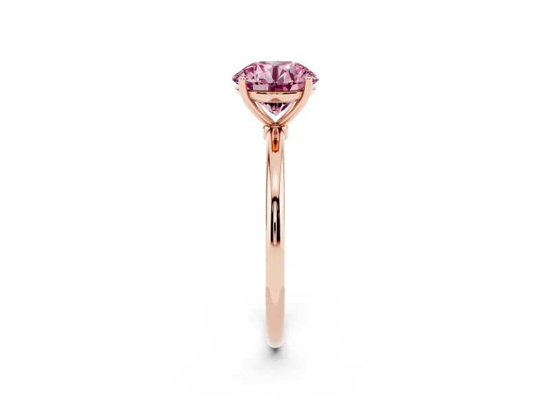 Fancy Pink Round Cut Diamond Solitaire Engagement Ring Set in Rose gold with Thin Band and Prong Setting