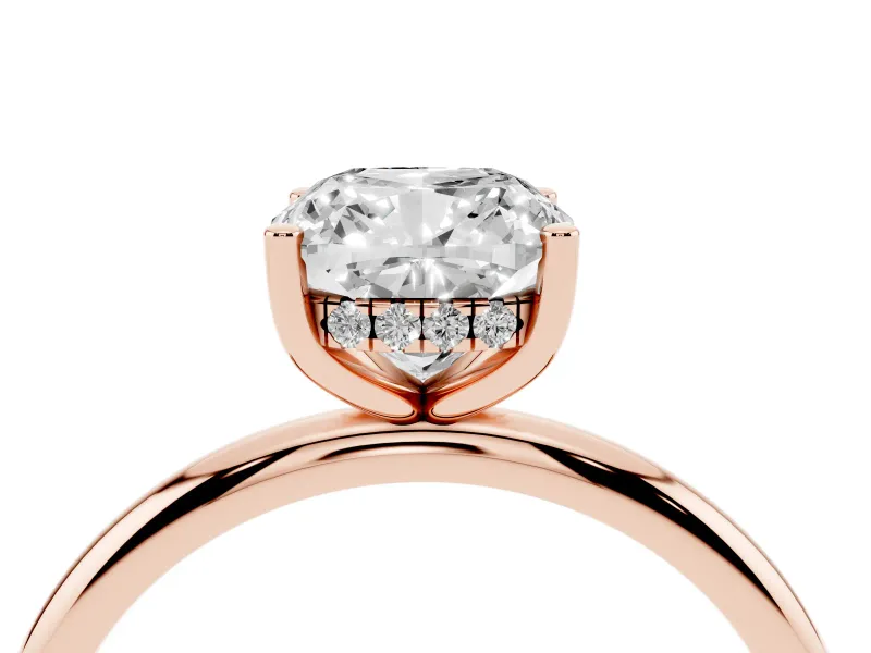 Cushion Cut Diamond Solitaire Engagement Ring Set in Rose gold with Prong Setting and Polished Band