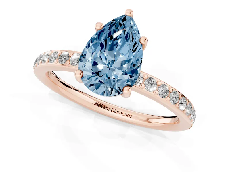 Fancy Blue Pear Cut Diamond Pavé Band Ring Set in Rose gold with Prong-Set Center Stone