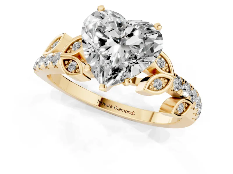 Heart Cut Diamond Solitaire Leaf-Inspired Ring Set in Yellow gold with Pavé Band and Prong Setting