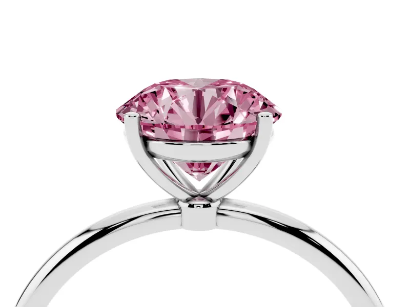 Fancy Pink Round Cut Diamond Solitaire Engagement Ring Set in Platinum with Thin Band and Prong Setting
