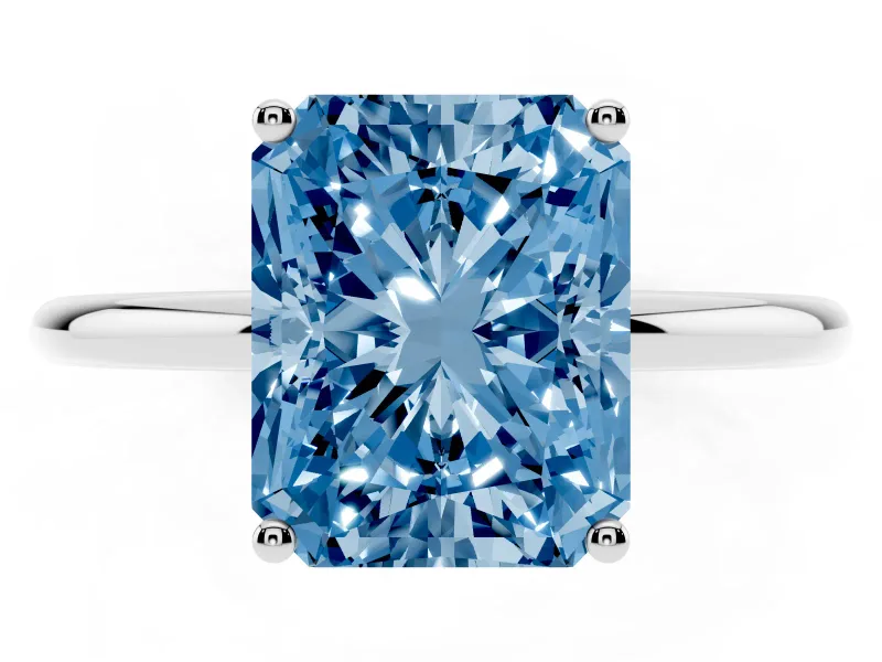 Fancy Blue Radiant Cut Diamond Solitaire Engagement Ring Set in White gold with Thin Band and Prong Setting