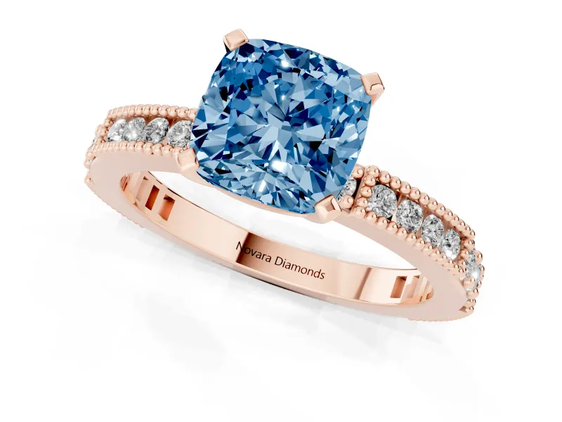 Fancy Blue Cushion Cut Diamond Solitaire Ring Set in Rose gold with Slim Pavé Band and Prong Setting