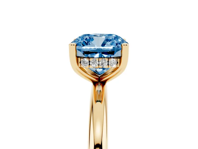 Fancy Blue Cushion Cut Diamond Solitaire Engagement Ring Set in Yellow gold with Prong Setting and Polished Band