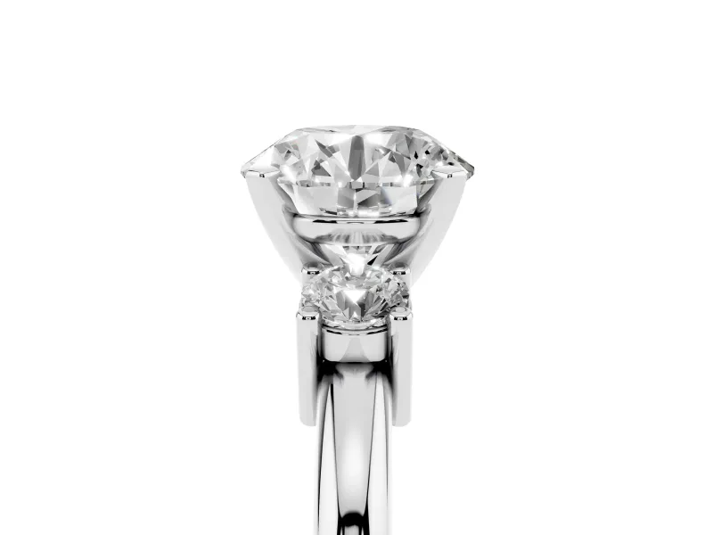 Three-Stone Round Cut Diamond Ring Set in White gold with Prong Setting and Plain Band